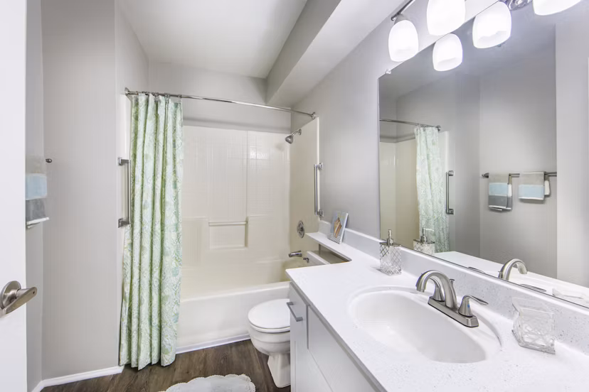 Bathroom featuring elegant fixtures and marble countertops at Overture San Marcos Apartment Homes
