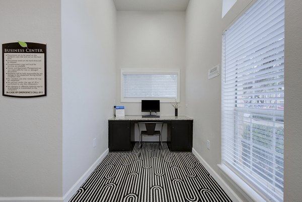 Business center with modern workspaces at Parc at Wall Street Apartments
