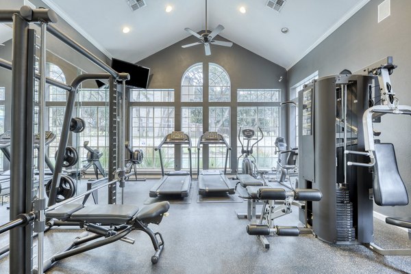 fitness center at Parc at Wall Street Apartments