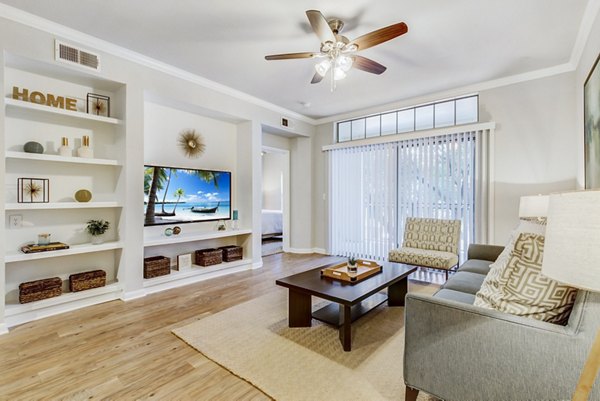 Modern living room with stylish decor at Riviera at West Village Apartments