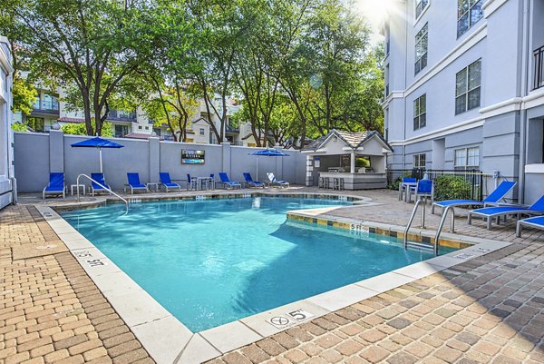 Serene poolside cabanas at Riviera at West Village Apartments, perfect for relaxation and leisure