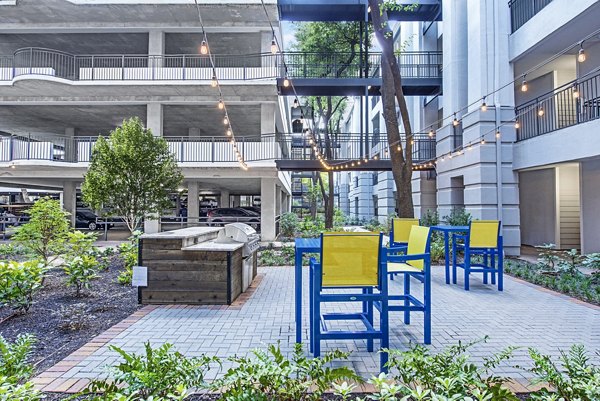 grill area at Riviera at West Village Apartments