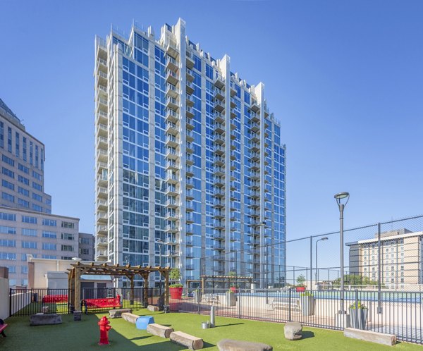 building/exterior/dog park at Skyhouse Uptown North Apartments