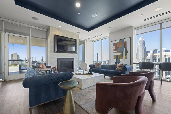 Chic clubhouse with modern furnishings in Skyhouse Uptown North Apartments