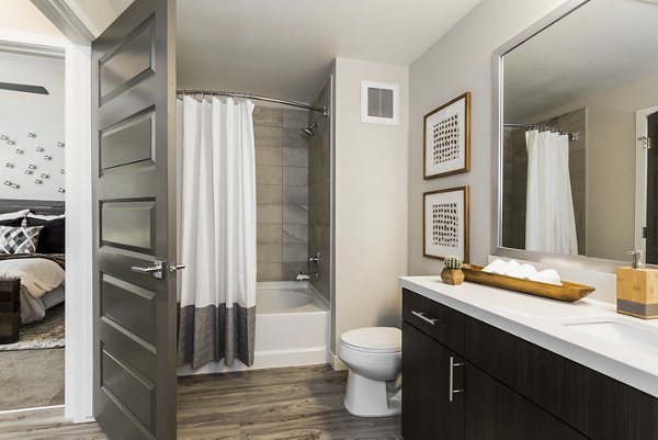 Modern bathroom with elegant fixtures at Solana Olde Town Station Apartments, offering luxury living in the heart of the community