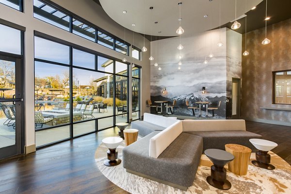 Clubhouse with modern design and cozy seating at Solana Olde Town Station Apartments in luxury complex