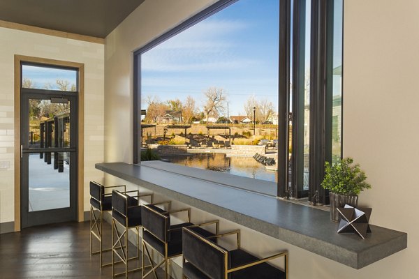 Solana Olde Town Station Apartments: Modern clubhouse featuring stylish lounge and seating areas, ideal for resident gatherings and events