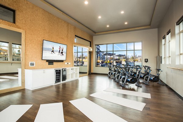 State-of-the-art fitness center with modern equipment at Solana Olde Town Station Apartments, promoting health and wellness living