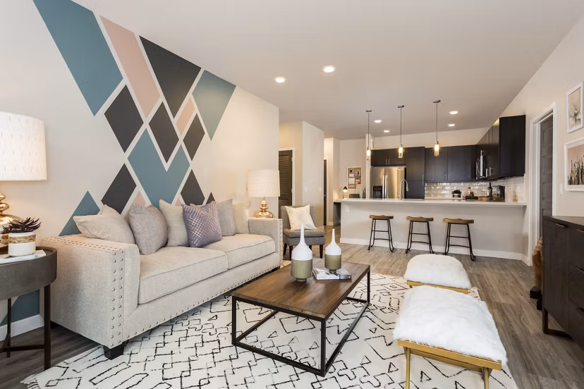 Cozy living room with modern dÃ©cor and natural light at Solana Olde Town Station Apartments