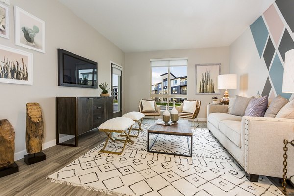 Spacious living room with modern design at Solana Olde Town Station Apartments in Arvada, Colorado, offering luxury rental options near transit stations