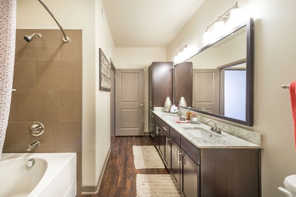 Elegant bathroom with sleek fixtures at Overture Flower Mound Apartments