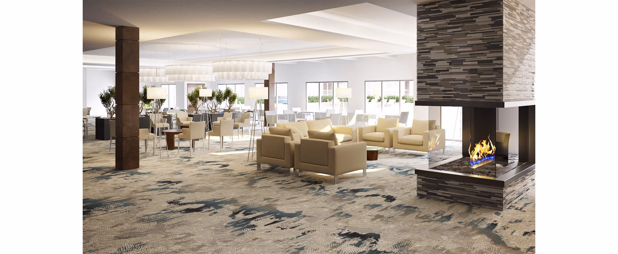 Modern lounge area featuring cozy seating and a fireplace in luxury apartments