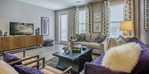 Cadence Music Factory: Modern clubhouse with lounge seating and entertainment options at luxury apartments in vibrant downtown location