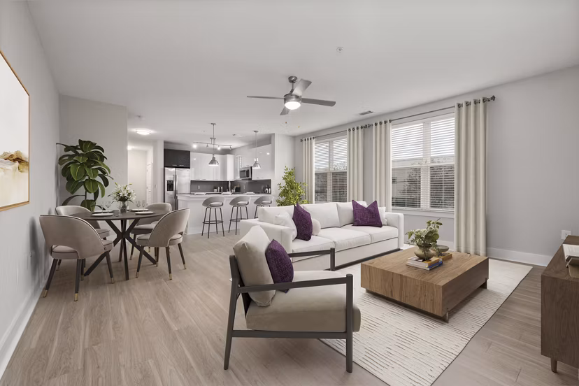 Spacious living room with modern decor in Cadence Music Factory Apartments