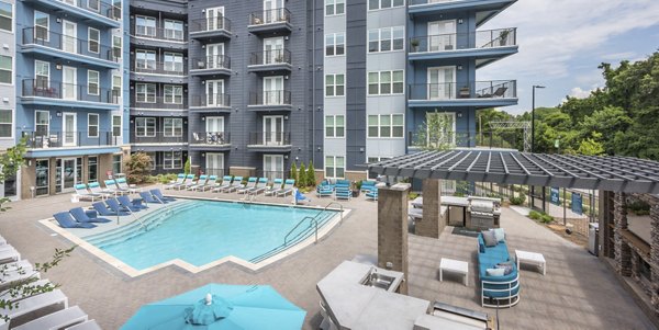 Olympic-sized outdoor pool at Cadence Music Factory Apartments