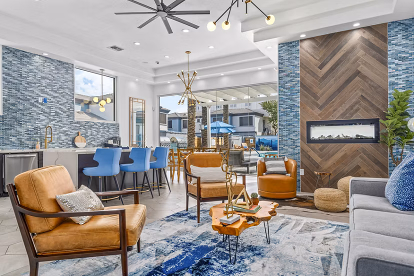 Stylish clubhouse lobby featuring modern decor and seating at Haven at Midtown Apartments