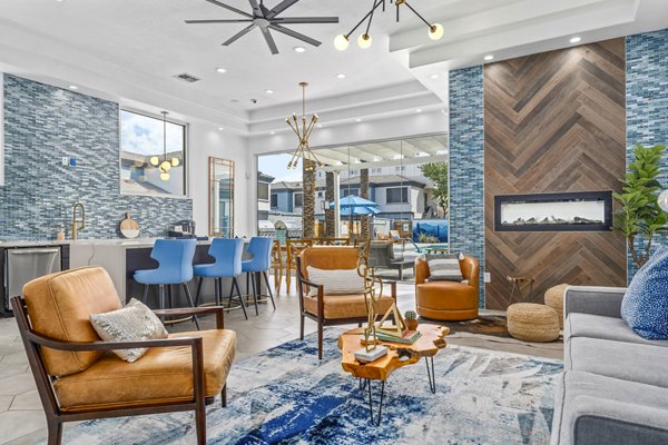 Stylish clubhouse lobby featuring modern decor and seating at Haven at Midtown Apartments