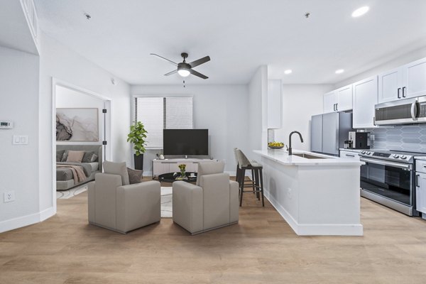 Spacious living room with modern decor in Haven at Midtown Apartments