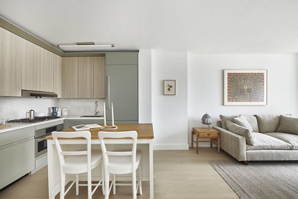 Spacious dining area with modern decor in Anagram NoMad Apartments, Greystar luxury apartment living in New York City