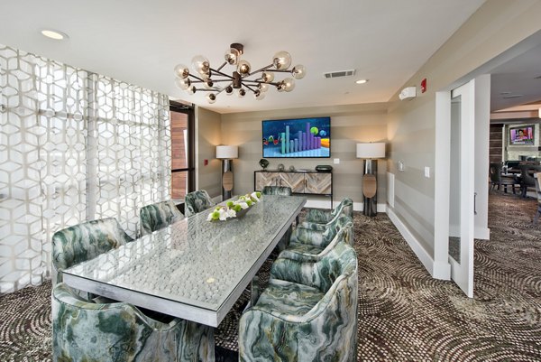 Modern meeting facility with conference seating at Overture Barrett Apartments, ideal for professional gatherings