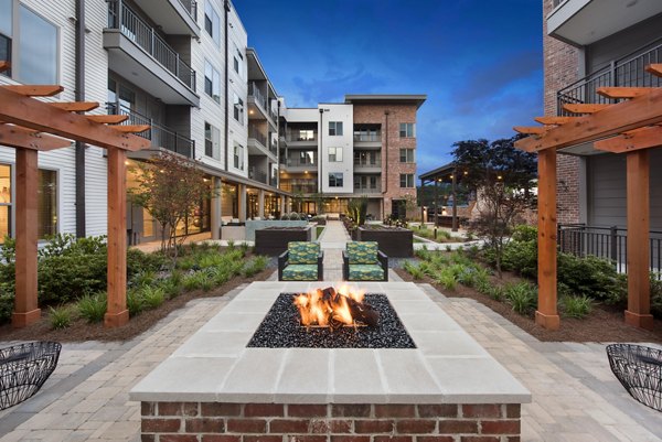 Overture Barrett Apartments: Stylish outdoor patio area with comfortable seating chairs in active adult community