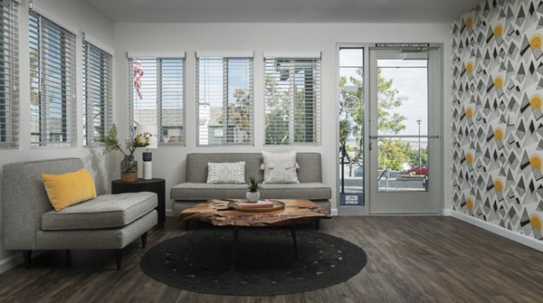 Contemporary clubhouse with modern furnishings at Vista at Trappers Glen Apartments, offering a stylish communal space for residents