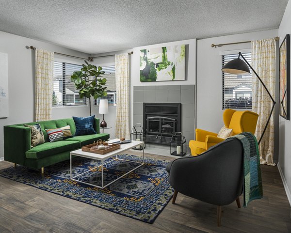 Living room with modern decor and natural light at Vista at Trappers Glen Apartments