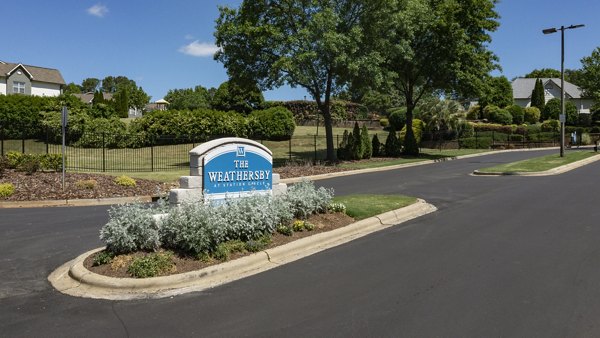 The Weathersby at Station Circle Apartments: Stylish signage showcasing property name