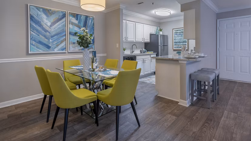 Dining area with contemporary furnishings at The Weathersby at Station Circle Apartments