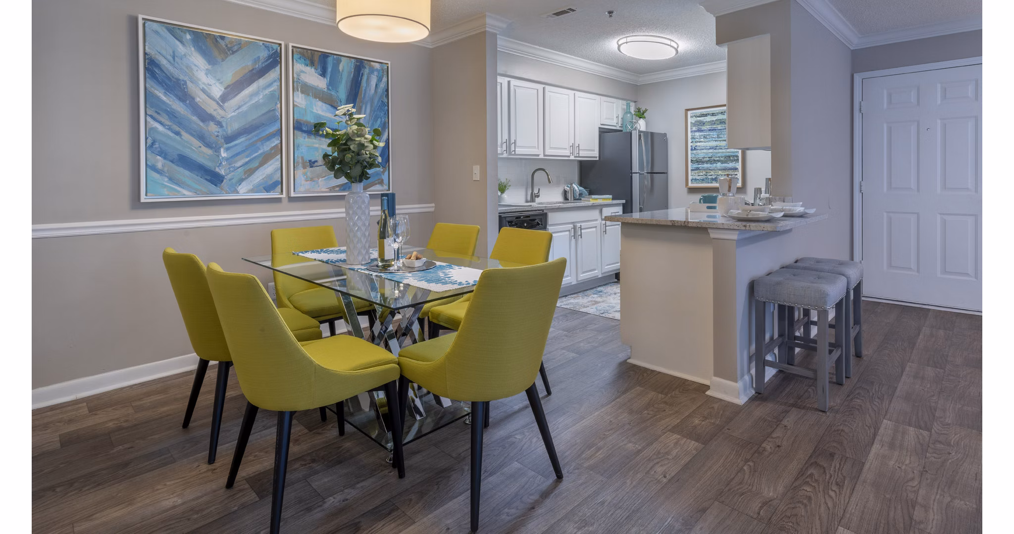 Dining area with contemporary furnishings at The Weathersby at Station Circle Apartments