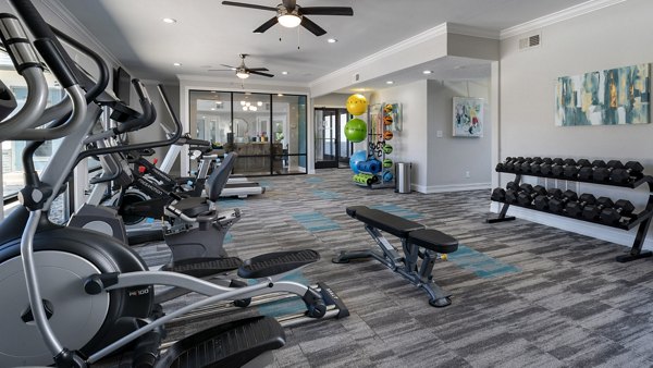 State-of-the-art fitness center with modern equipment at The Weathersby at Station Circle, a Greystar luxury apartment community