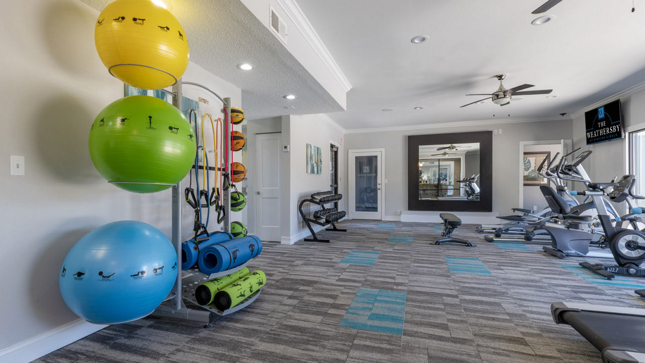 Gym at The Weathersby At Station Circle Apartments (4 of 4)