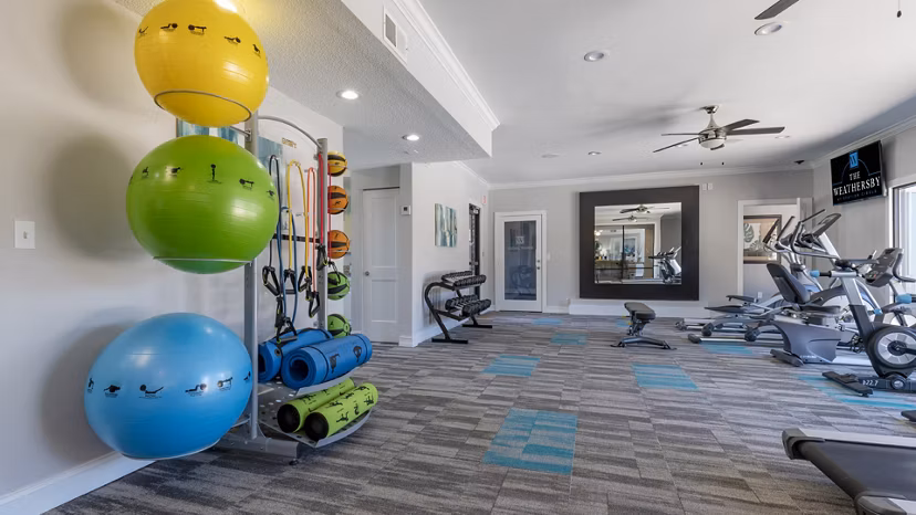 State-of-the-art fitness center with modern equipment at The Weathersby at Station Circle Apartments, ideal for active lifestyles