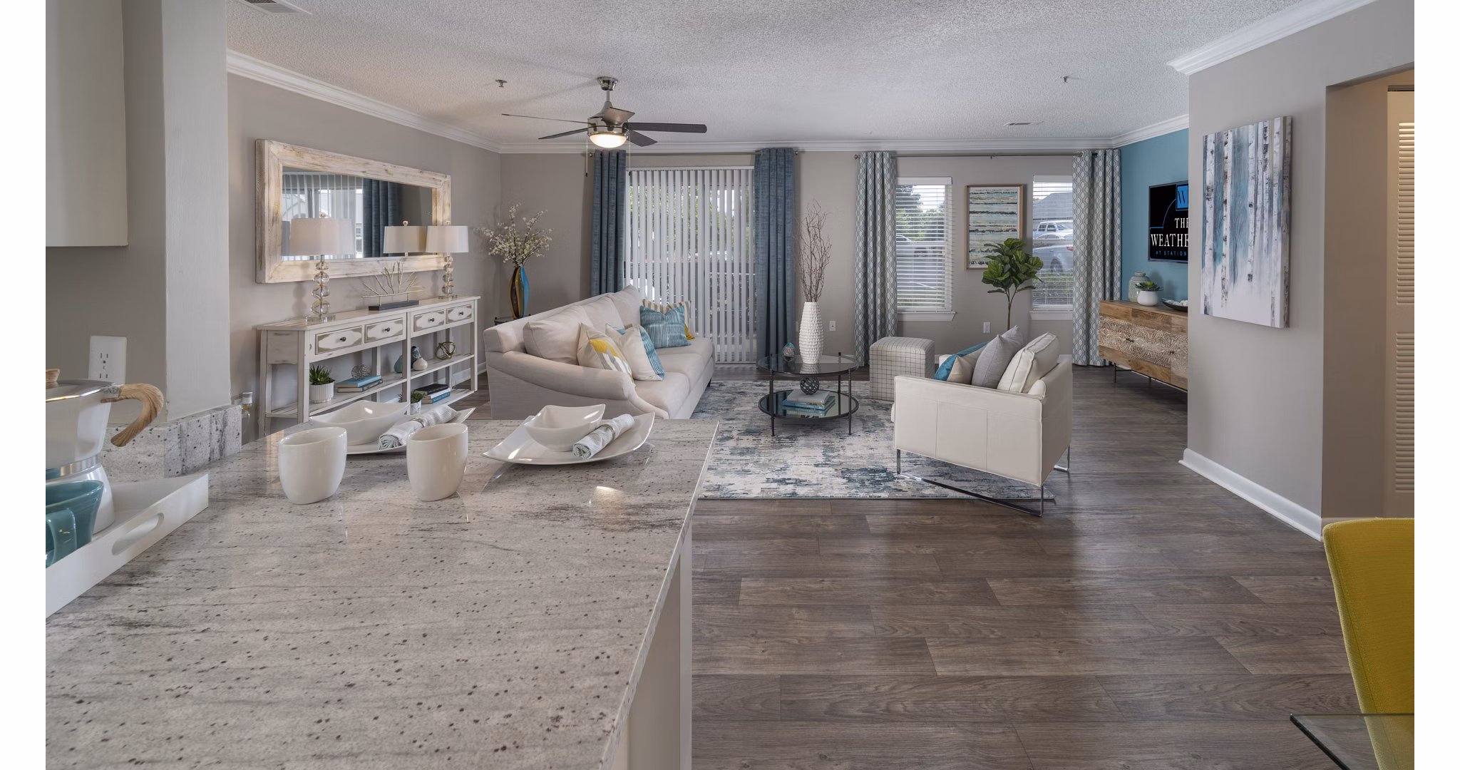 Modern kitchen with stainless steel appliances in The Weathersby at Station Circle Apartments