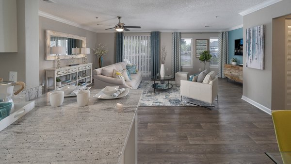 Modern kitchen with stainless steel appliances in The Weathersby at Station Circle Apartments