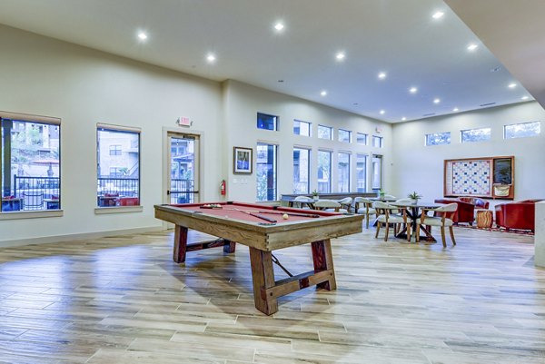 clubhouse game room at Rustico Apartments