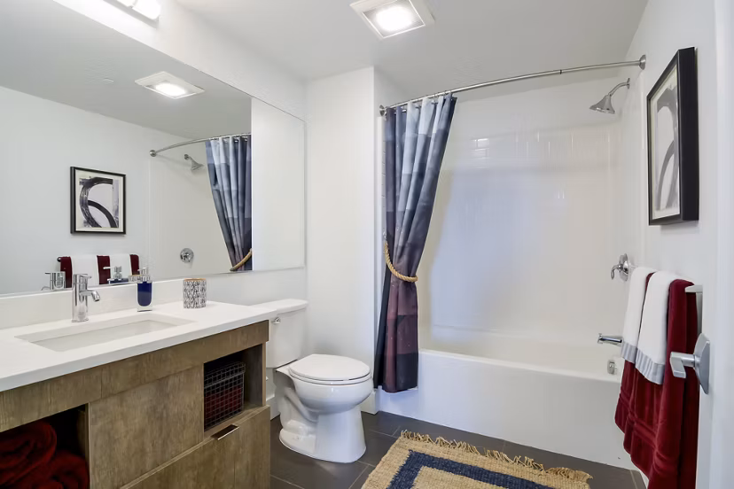 Bathroom with modern tile and fixtures at The Martin Apartments