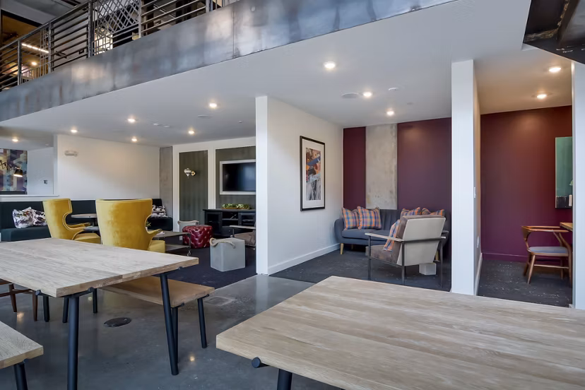 Clubhouse at The Martin Apartments offering modern design and spacious seating areas in luxury high-rise Greystar community