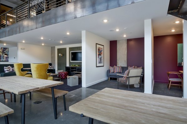 Clubhouse at The Martin Apartments offering modern design and spacious seating areas in luxury high-rise Greystar community