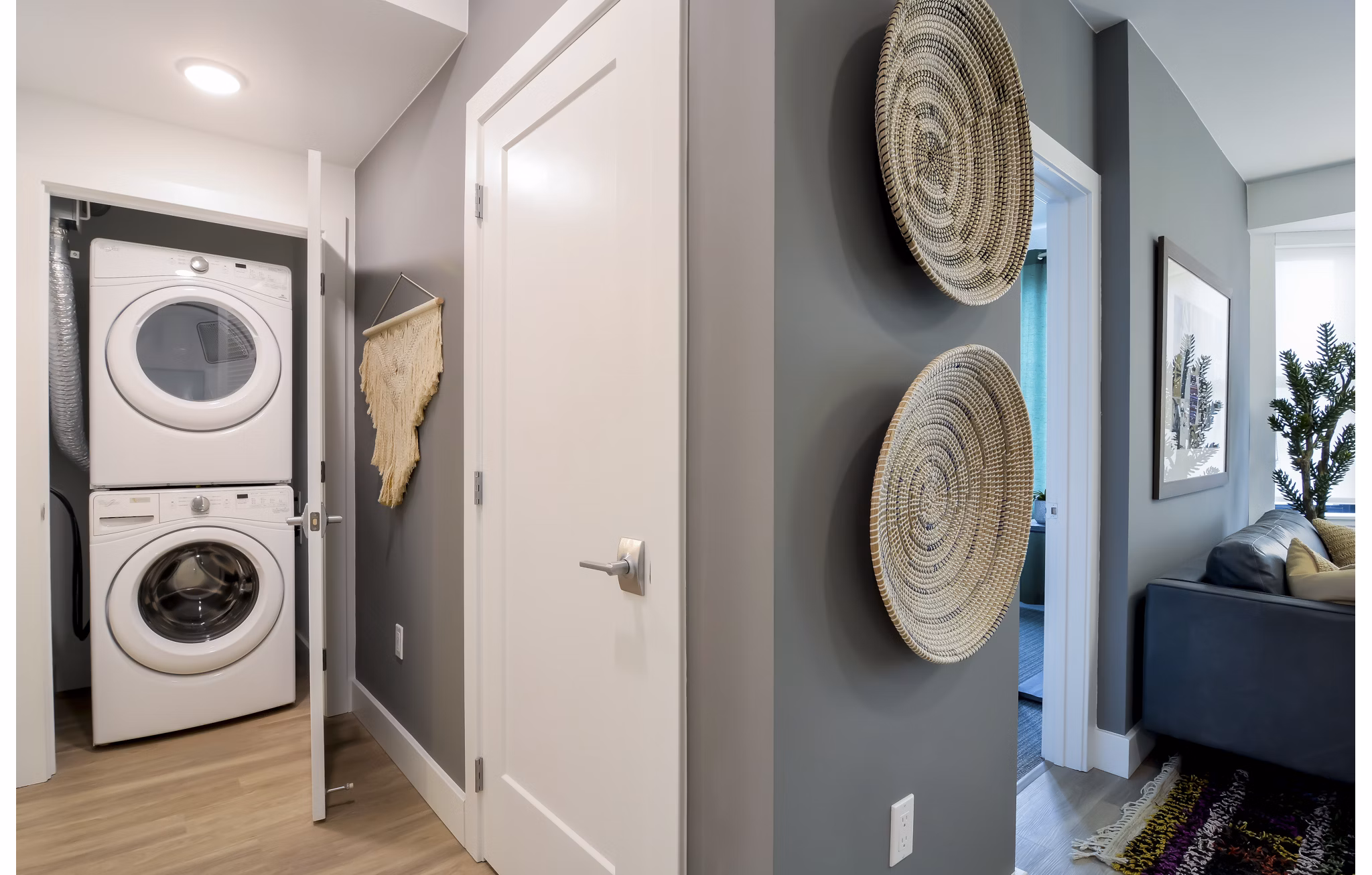 Modern laundry room with high-efficiency washers and dryers at The Martin Apartments, a Greystar luxury community in downtown