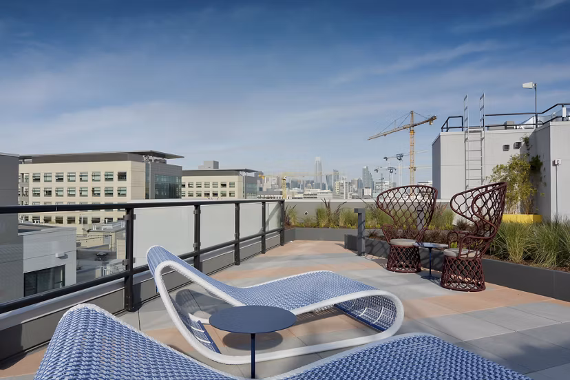 Rooftop patio with skyline views at The Martin Apartments, a Greystar luxury property in downtown San Francisco.