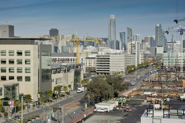 The Martin Apartments: Stunning skyline view from a luxury high-rise balcony in Seattle