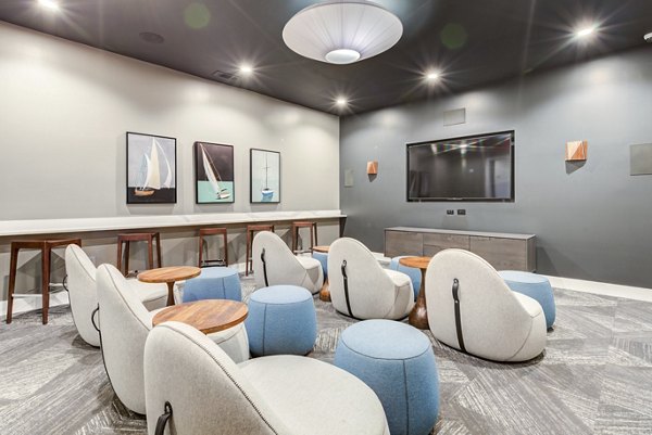 Modern clubhouse with sleek design at Element Barclay Apartments, a luxury community offering premium amenities and stylish living spaces