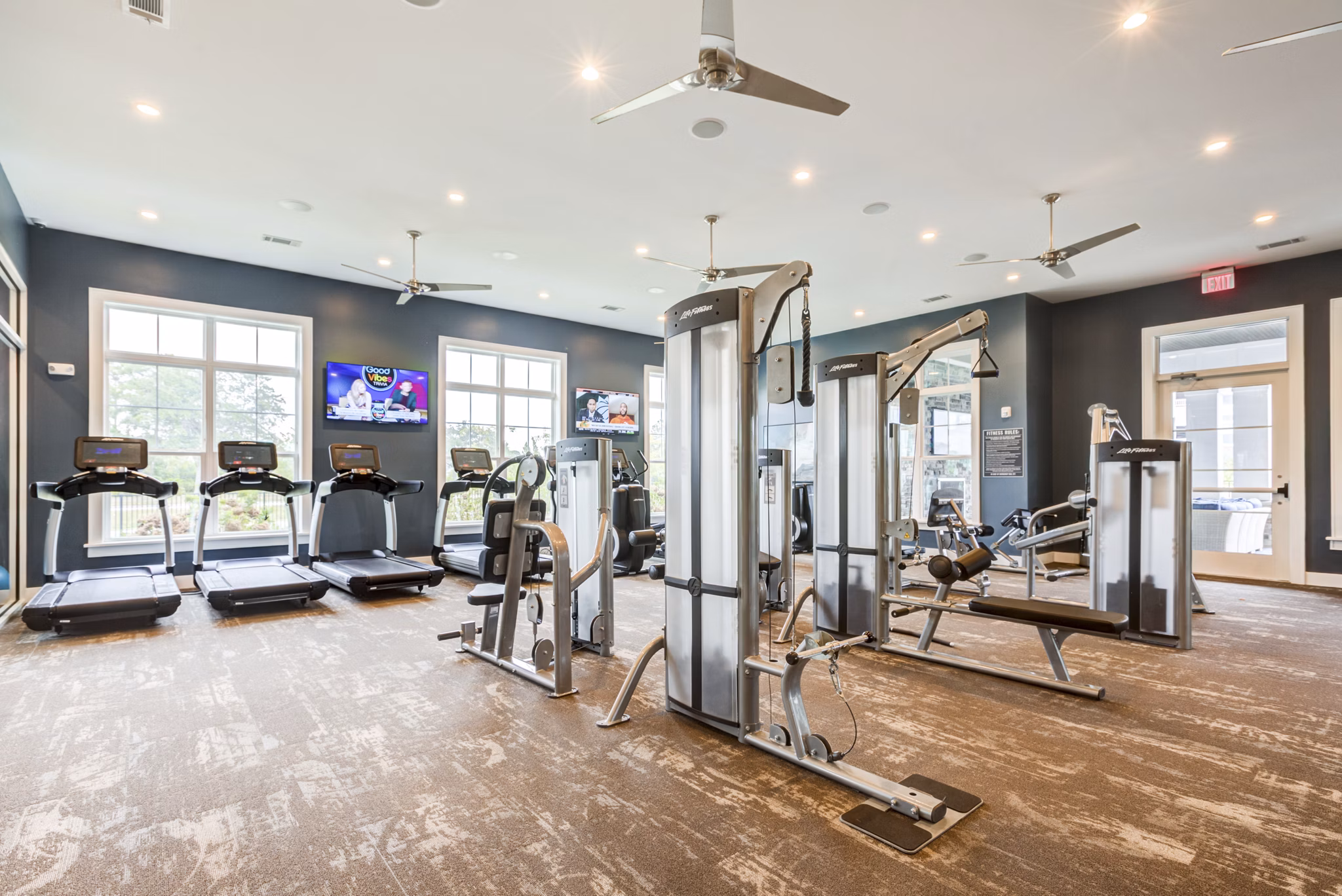 Modern fitness center with state-of-the-art equipment at Element Barclay Apartments
