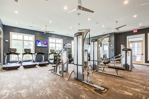 Modern fitness center with state-of-the-art equipment at Element Barclay Apartments