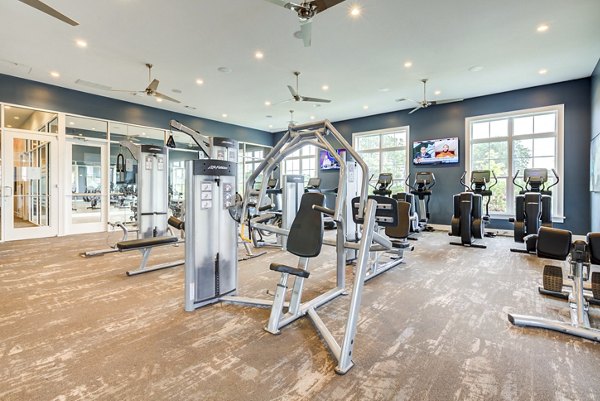 Modern fitness center with state-of-the-art equipment at Element Barclay Apartments