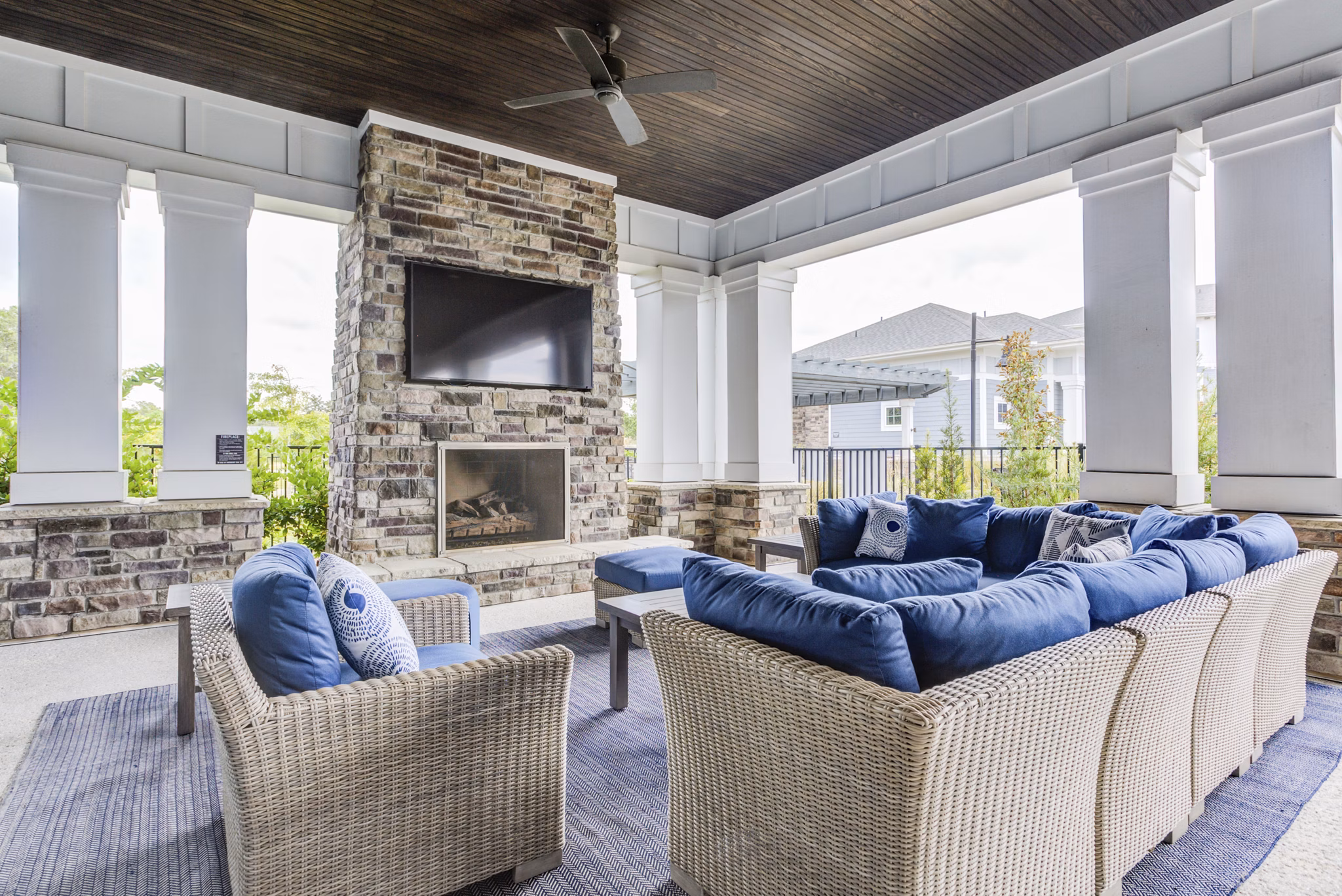 Tranquil courtyard with lush greenery at Element Barclay Apartments for relaxation and recreation in a luxurious setting