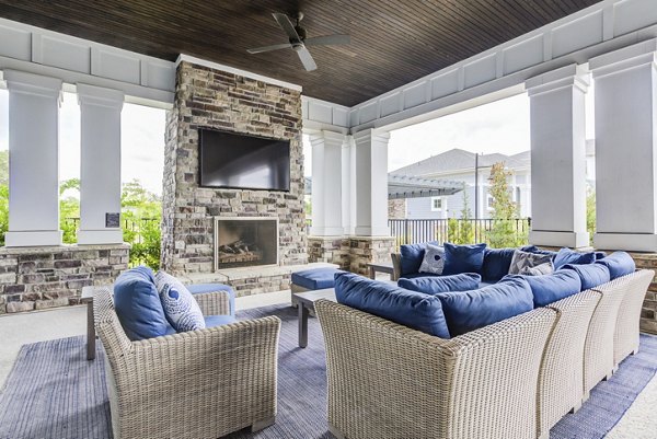 Tranquil courtyard with lush greenery at Element Barclay Apartments for relaxation and recreation in a luxurious setting