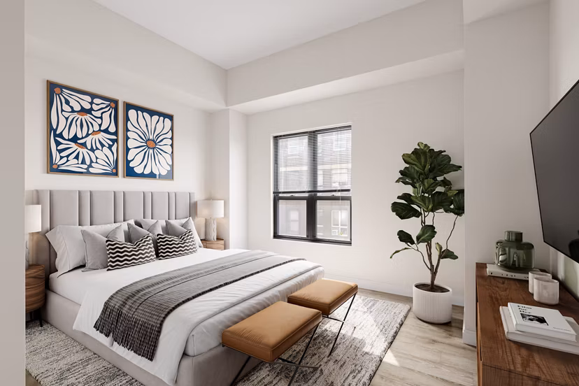 Cozy bedroom with elegant decor at James and Harrison Court Apartments