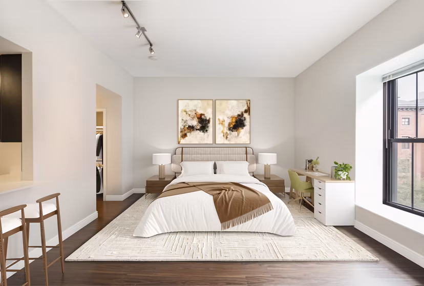 Cozy bedroom with modern decor at James and Harrison Court Apartments